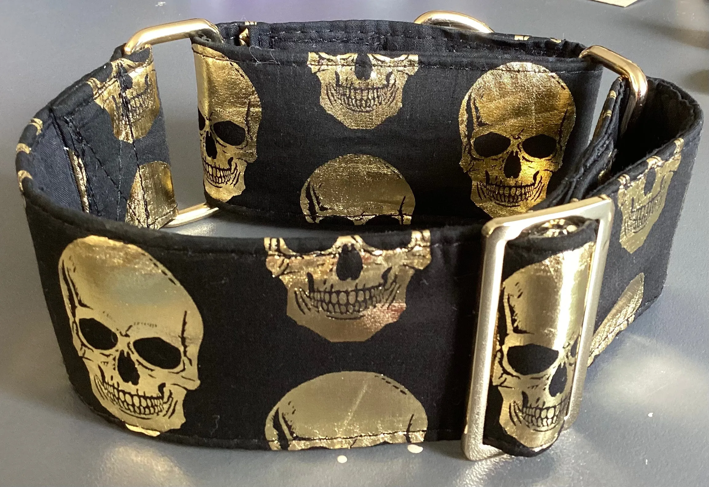 Black Martingale collar with metallic golden skulls 50mm width