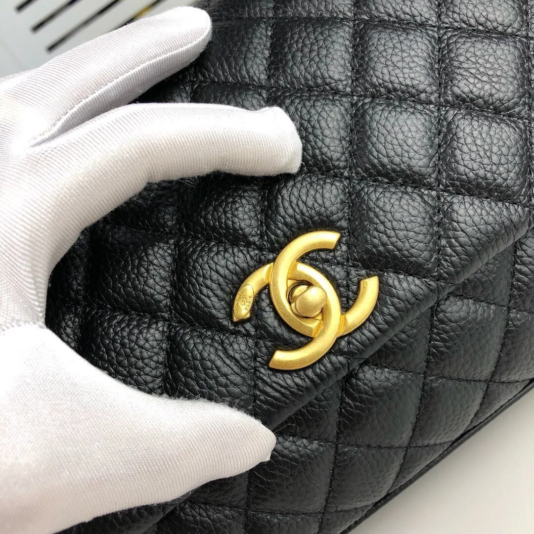 Designer bags by Chanel 218