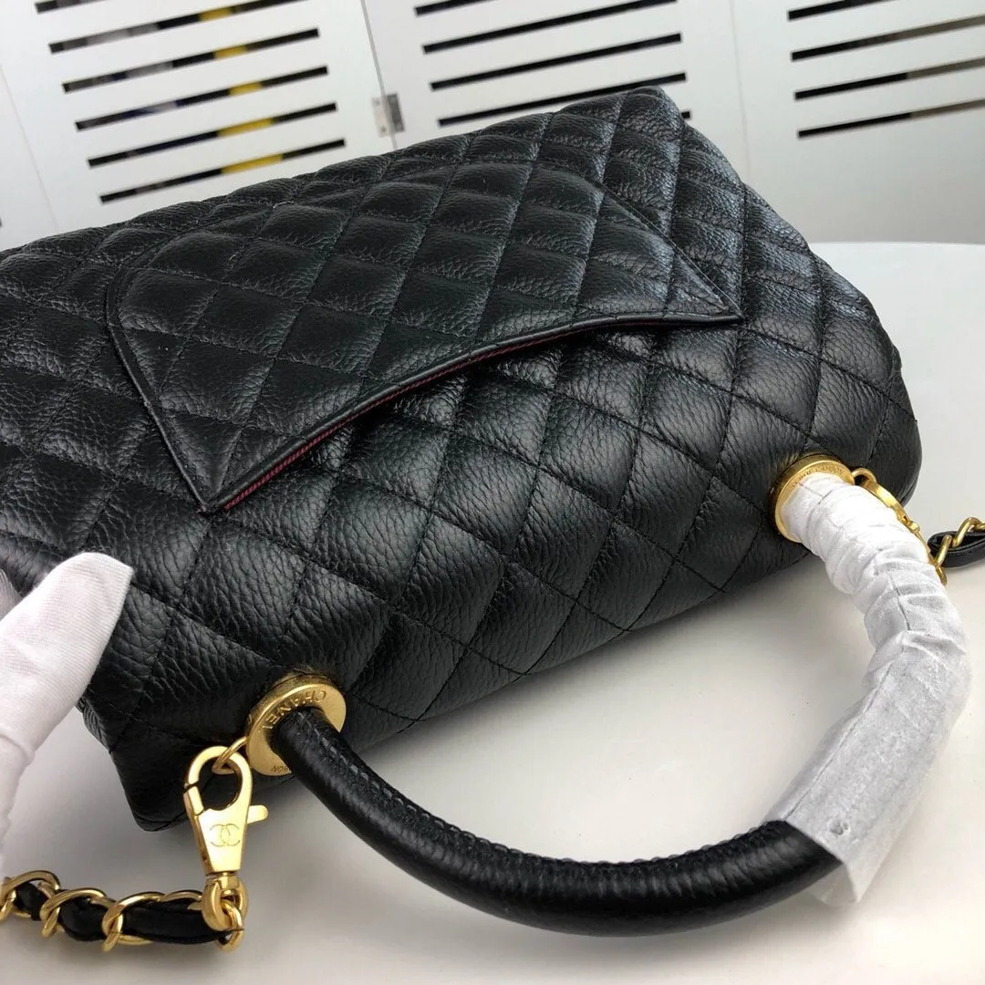 Designer bags by Chanel 218