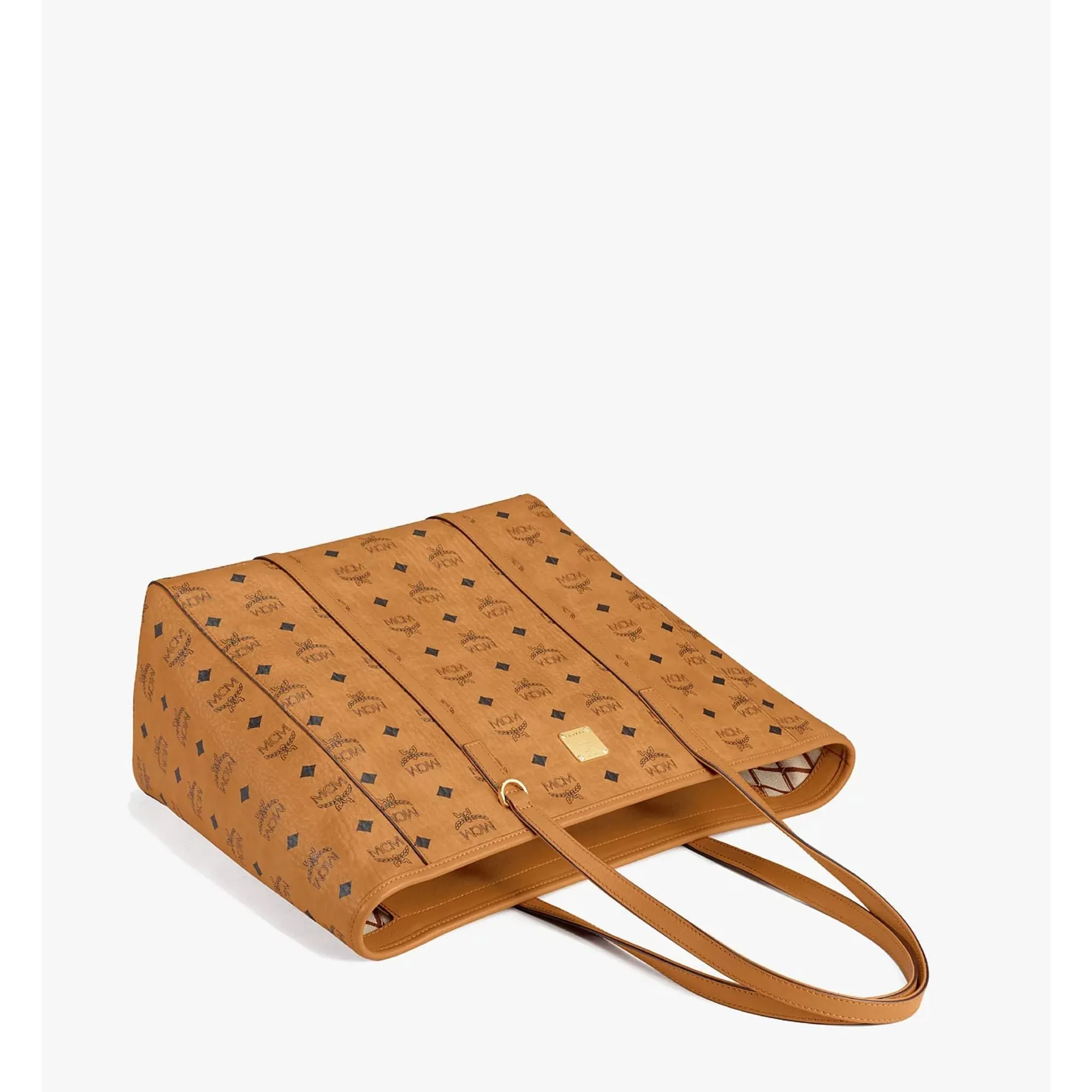 MCM medium shopper with bold visuals, sculpted in monogram coated canvas AW20