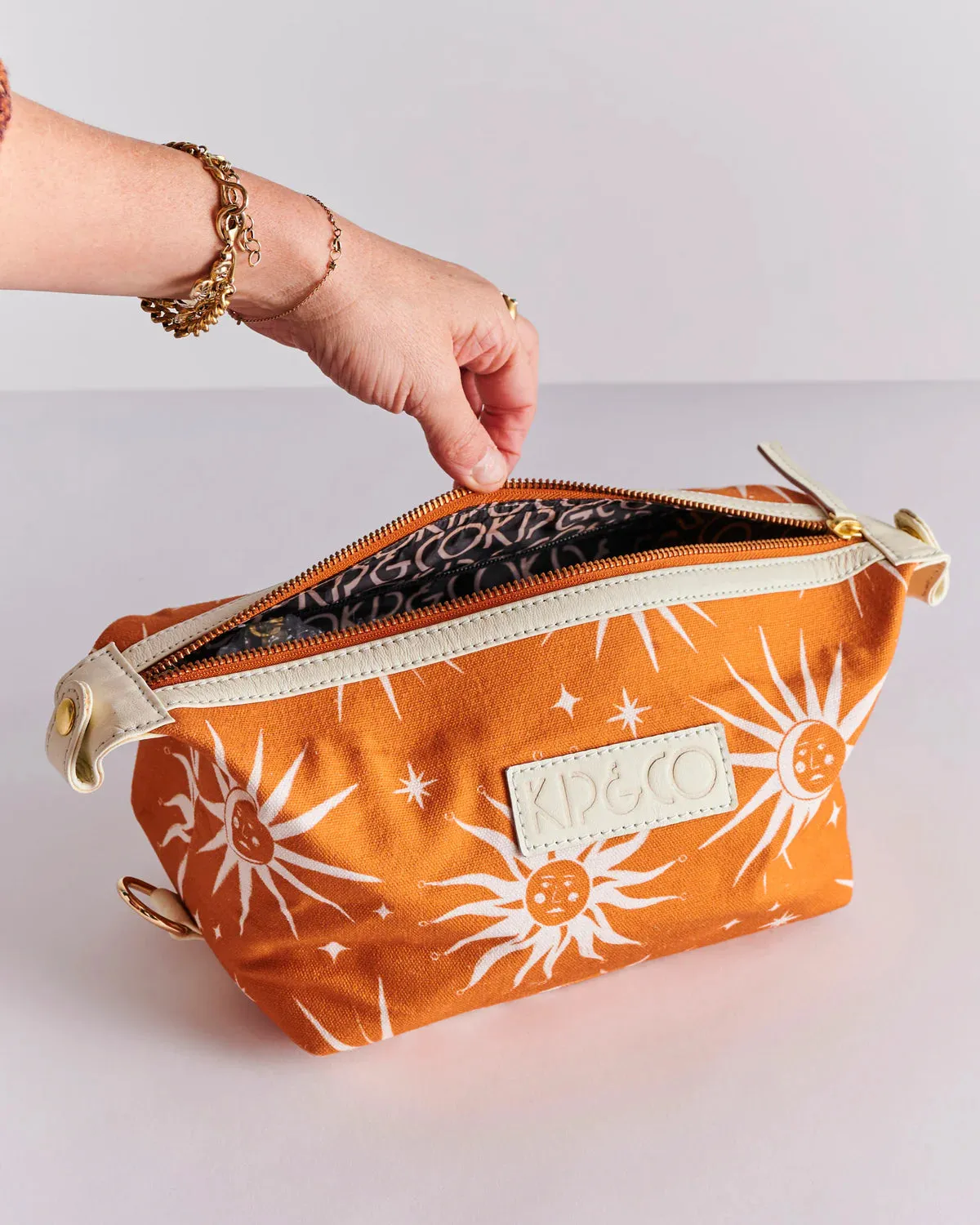 RAY OF LIGHT OCHRE TOILETRY BAG